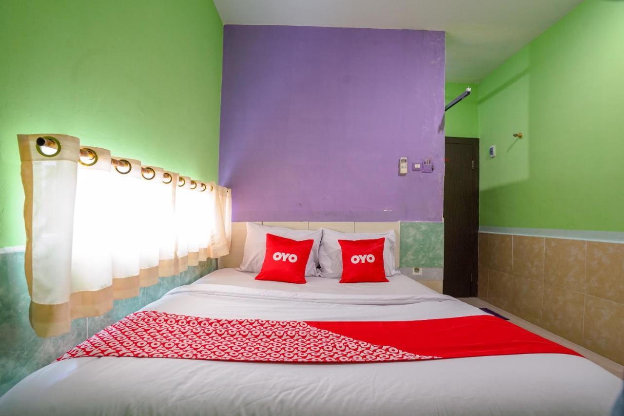 Oyo 1495 Hotel Lendosis Palembang Eksteriør billede
